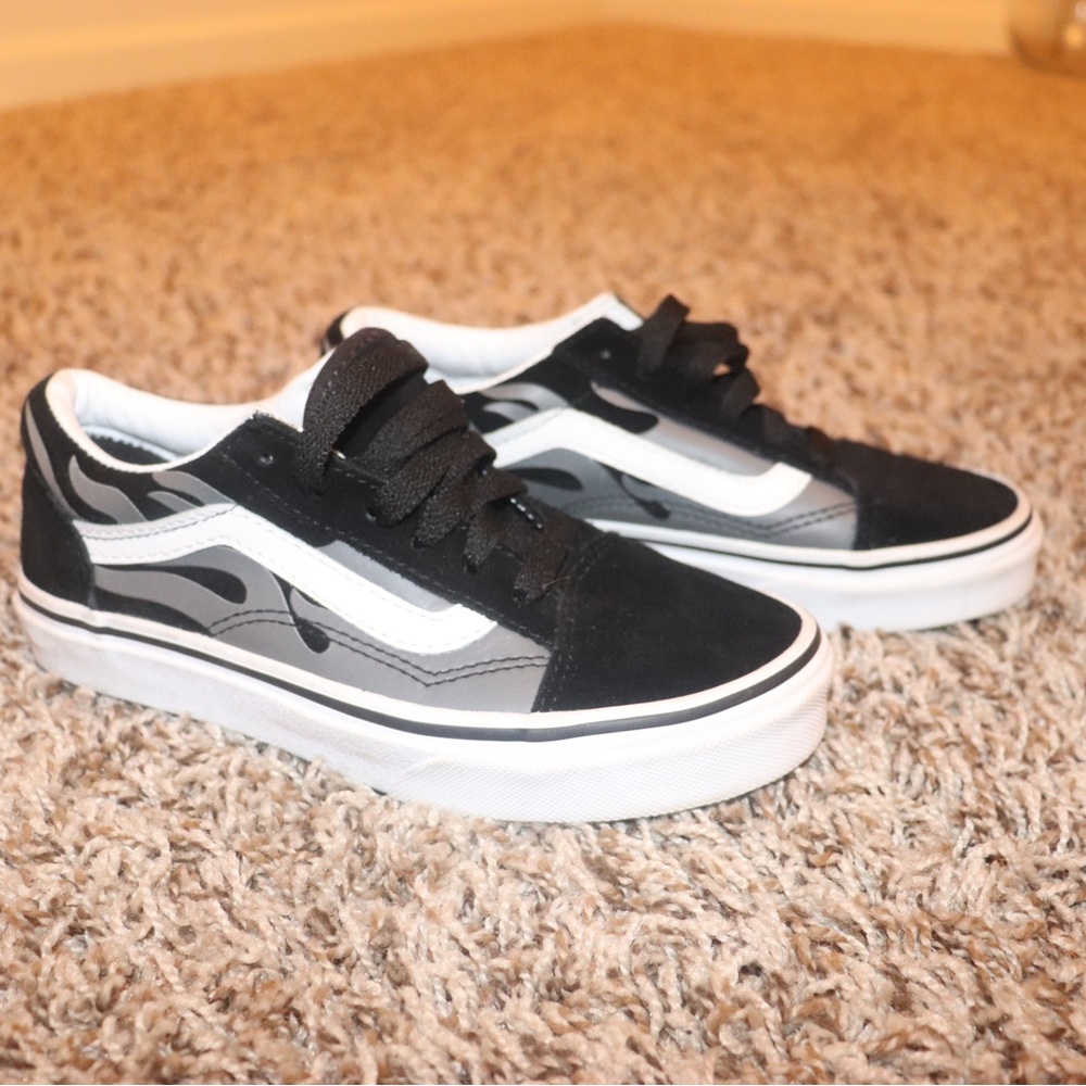 Black, white, & gray Vans